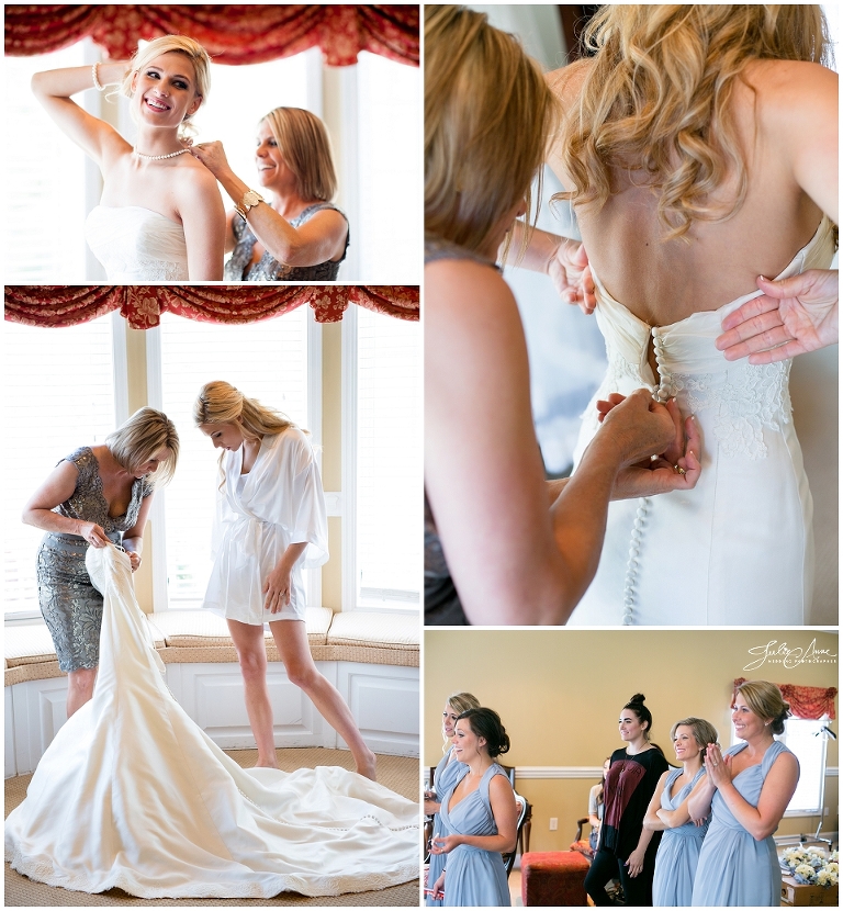 bride getting ready with help from her mother. special moment at glendalough manor venue in tyrone by julie anne photo