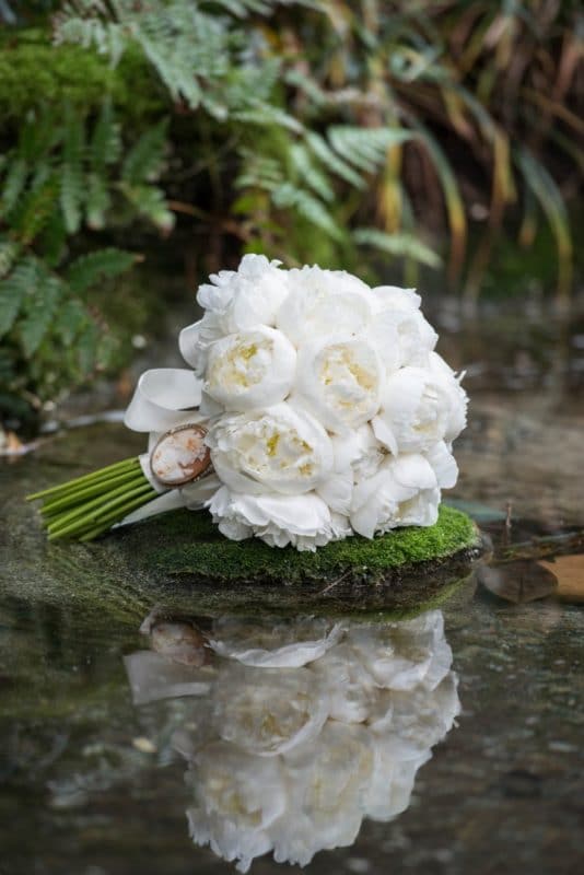 reflection of a white peony bridal bouquet at the Grand Hyatt Buckhead by julie anne photography, fine art wedding atlanta